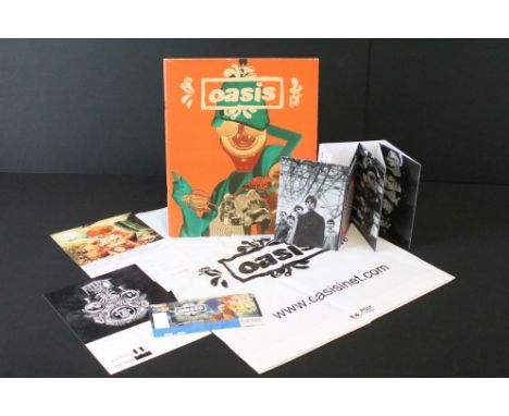 Memorabilia - Oasis 2008/9 tour programme, ticket (Manchester), set of 5 postcards, 21 fan club mailers, carrier bag.