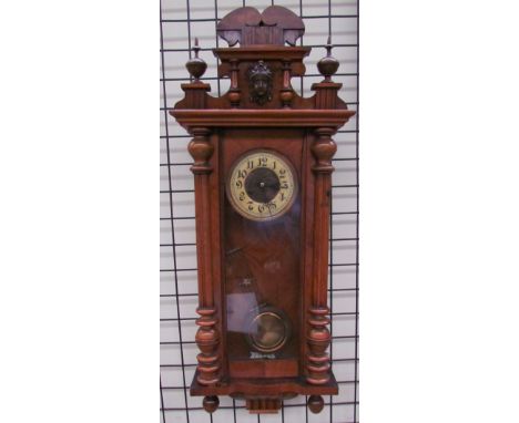 A walnut cased Vienna regulator type wall clock together with mouldings and a mantle clock