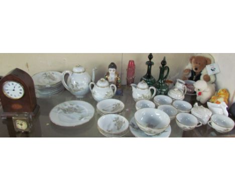 A Japanese part tea set together with green glass ewers, cranberry glass vase, belle, Edwardian mahogany mantle clock, brass 