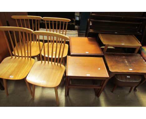 A teak nest of three tables together with an oak tea trolley, teal wall rack, walnut table, foot stool, teak nest of two tabl