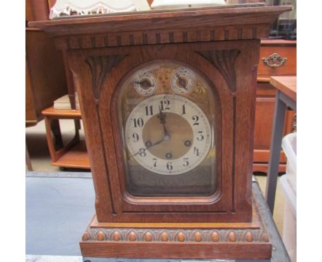 An Edwardian mantle clock, with a chime silent dial, slow fast dial and silvered chapter ring with Arabic numerals, the backp