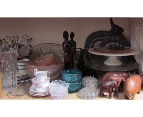 African carvings together with blue and white plates, glass dishes, glass vases, part dressing table sets, etc