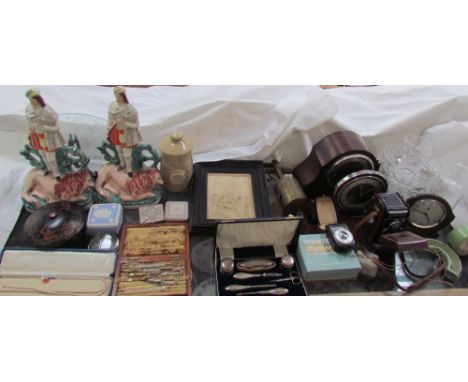 A Rolleiflex camera together with mantle clocks, ivorex panel, brass spit jack, light meter, cased silver topped nail set, st