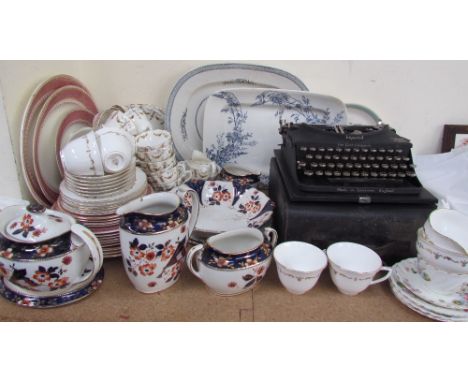 An imperial typewriter together with a Royal Worcester part tea set, other part tea and dinner sets, meat plates etc