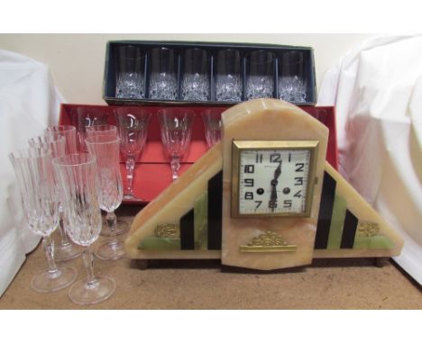 An Art Deco style mantle clock together with boxed and loose crystal drinking glasses