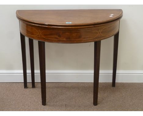 George III mahogany demi lune card table, inlaid with box wood stringing and crossbanded in Kingwood, foldover baize lined to