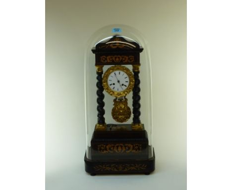 French Empire period ebonised Portico clock with inlaid plinth and pedestal,  striking on bell complete with 19th century glo