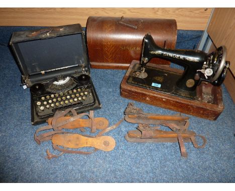 Vintage Underwood typewriter, Singer sewing machine, and two pairs of 19th/20th century ice skates