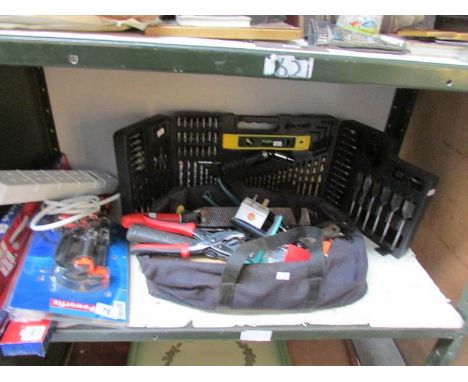 A shelf of tools etc.,