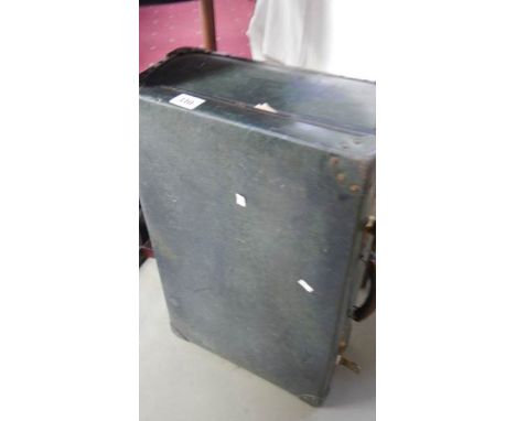 A vintage suitcase and 2 pairs of trousers including cricket whites,