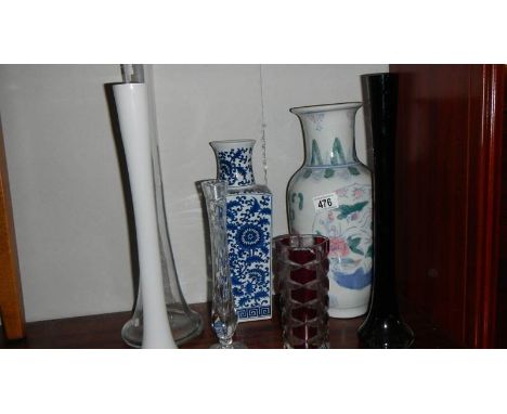 5 glass and 2 ceramic vases.