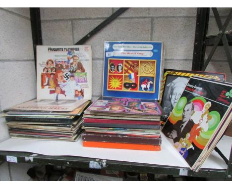 A shelf of LP records.