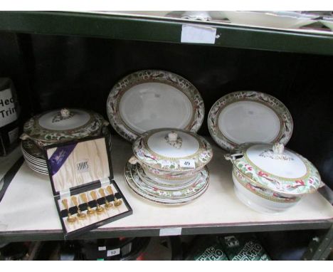 A shelf of dinner ware, some a/f.
