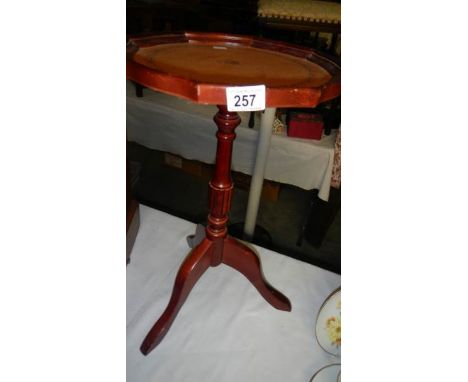 A tripod wine table.