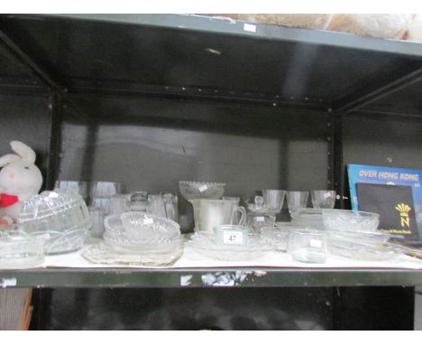 A shelf of glass ware.