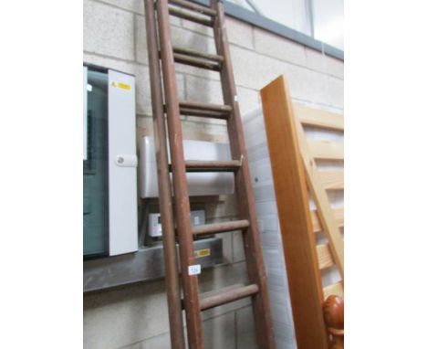 A double wooden ladder.