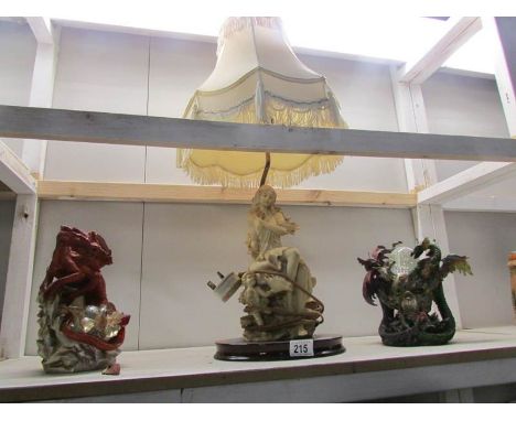 A figural table lamp and 2 dragon lamps (slight a/f)