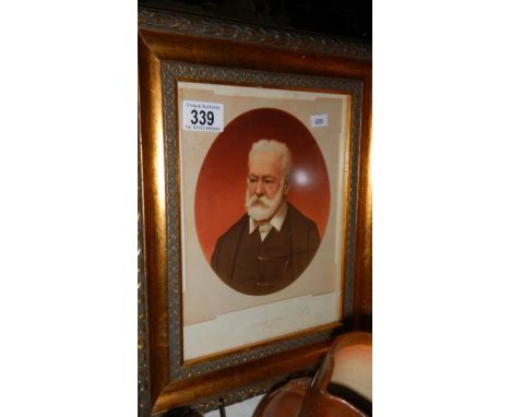 A framed and glazed portrait print of Victor Hugo.