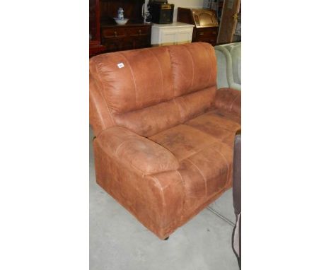 A tan leather sofa.