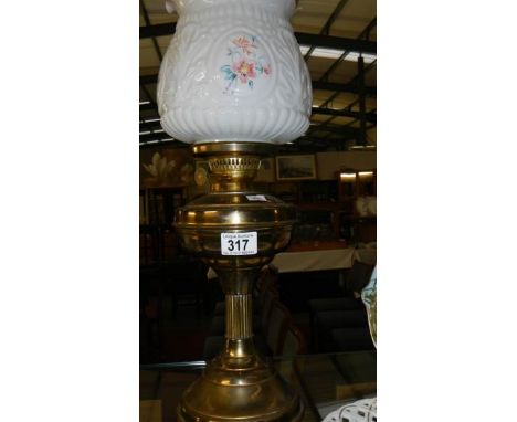 A brass oil lamp.