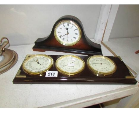 A mantel clock and a barometer,