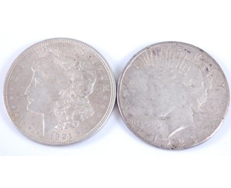 U.S.A., 1921 Morgan dollar, Liberty head above date, rev; spread eagle with arrows within wreath, together with a 1928 San Fr