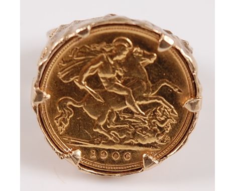 Great Britain, 1906 gold half sovereign, Edward VII, rev; St George and Dragon above date, in a textured 9 carat gold ring mo