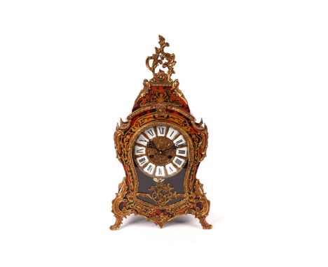 A modern Italian boulle bracket clock in the Louis XV style, the circular dial with Roman enamel numerals within gilt surroun