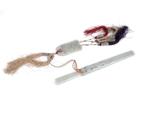 A Chinese carved jade dagger and sheath, Qing, the steel blade with tapered jade handle, the pale green jade sheath of even c