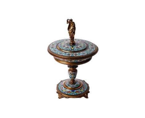 A late 19th Century Continental champlevé enamel and ormolu centrepiece, the floral enamelled comport with a circular cover b