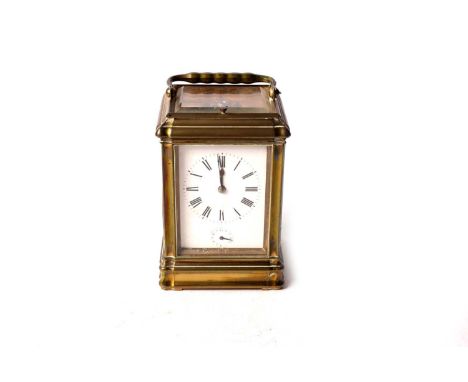 A late 19th Century French brass repeating carriage clock, by Gay Lamaille Paris, the white enamel Roman dial with subsidiary