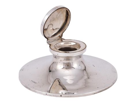 
	
		A SILVER CAPSTAN INKWELL
		REID &amp; SONS, CHESTER 1923
		21cm (8 1/4in) diameter
		Loaded

	

