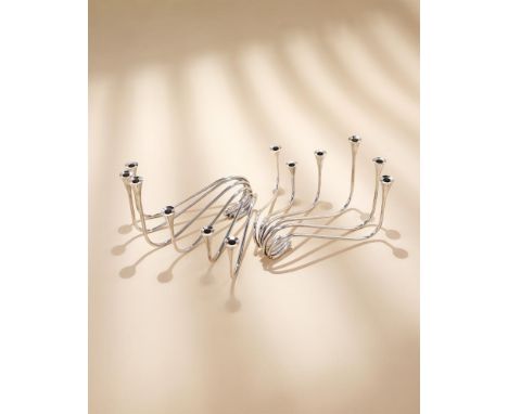
	
		A PAIR OF DANISH SILVER WAVE PATTERN SIX BRANCH CANDELABRA
		A. MICHELSEN, COPENHAGEN, SPONSOR&#39;S MARK FOR R. C. P. L