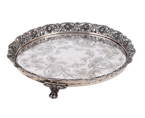 
	
		A CONTINENTAL SILVER COLOURED SHAPED CIRCULAR SALVER
		STAMPED PB MK 800
		With a ropetwist and floral border, engraved 
