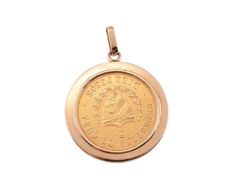 
	
		CUBA, FIRST REPUBLIC, A 10 PESOS COIN 1916
		0.900 fine, 16.72g (KM 20), in a gold mount engraved W. K. THOMAS DEL PERSO