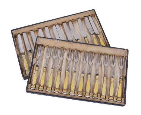 
	
		A CASED SET OF TWELVE SILVER AND ENAMEL HANDLED FRUIT KNIVES AND FORKS
		TURNER &amp; SIMPSON LTD., BIRMINGHAM 1933
		Wi
