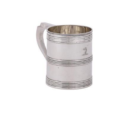 
	
		A GEORGE III SILVER TANKARD
		ANN ROBINSON, NEWCASTLE CIRCA 1808
		With a scroll handle, three reeded bands and engraved