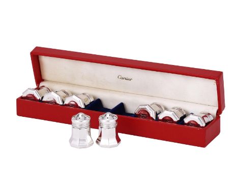 
	
		A BOXED SET OF EIGHT SILVER COLOURED OCTAGONAL PEPPERETTES
		CARTIER, STAMPED STERLING
		With pierced covers
		4cm (1 1/