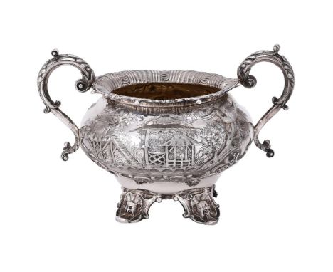 
	
		A VICTORIAN SILVER TWIN HANDLED BALUSTER SUGAR BOWL
		HENRY HOLLAND, LONDON 1867
		With twin foliate capped scroll handl