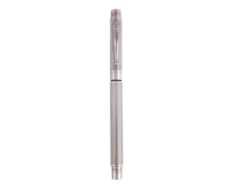 
	
		GEORG JENSEN, TORSTEN THORUP 
		A SILVER COLOURED FOUNTAIN PEN 
		Cap and Barrel: The cap and barrel with engraved latti