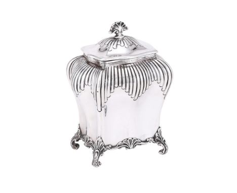 
	
		A VICTORIAN SILVER TEA CADDY
		LEE &amp; WIGFULL, SHEFFIELD 1897
		With a shell finial to the domed cover, the half ribb