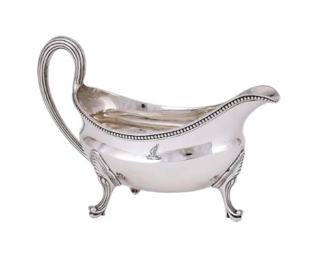 
	
		A GEORGE III SILVER OVAL SAUCE BOAT
		JOHN WAKELIN &amp; ROBERT GARRARD, LONDON 1793
		With a reeded border, a loop hand