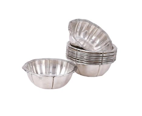 
	
		A SET OF ELEVEN GERMAN SILVER SHAPED CIRCULAR BOWLS
		M. H. WILKENS &amp; SOHNE, BREMEN-HEMELINGEN, .830 STANDARD
		With