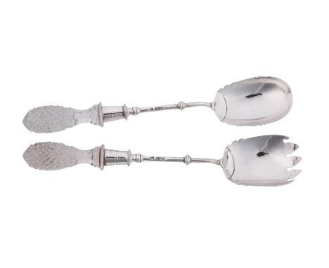 
	
		A PAIR OF VICTORIAN SILVER MOUNTED AND GLASS SALAD SERVERS
		FENTON BROTHERS LTD., SHEFFIELD 1894
		The backs of the bow