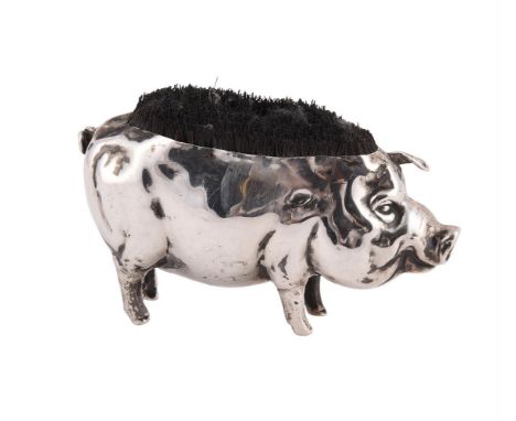 A SILVER PEN WIPE IN THE FORM OF A PIG HENRY MATTHEWS, BIRMINGHAM 1904 8cm (3 1/4in) long Loaded  Condition Report:  Marks cl