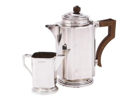
	
		AN ART DECO SILVER TEA POT AND CREAM JUG
		CHARLES S. GREEN &amp; CO. LTD., BIRMINGHAM 1934 AND 1936 
		The tea pot with