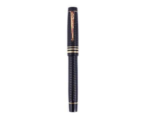 
	
		CONWAY STEWART, DURO HERITAGE, NO.31 
		A BLACK RESIN AND 18 CARAT GOLD FOUNTAIN PEN, 2007 
		Cap and Barrel: The black 