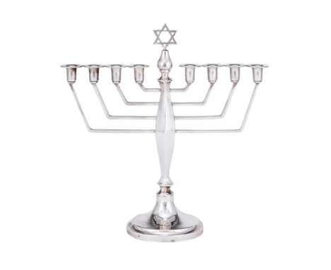 
	
		A SILVER EIGHT LIGHT MENORAH
		ALBERT SYDENHAM, BIRMINGHAM 1980
		With a Star of David terminal flanked by eight branche