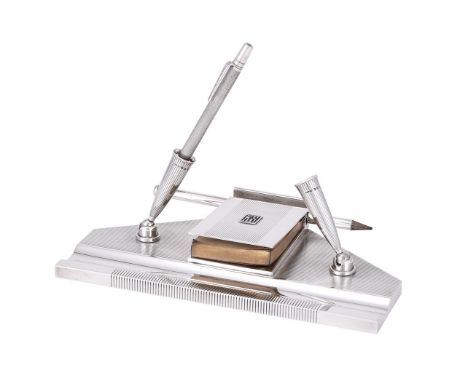
	
		A SILVER DESK STAND
		ASPREY &amp; CO. LTD., LONDON 1936
		With reeded decoration, applied with KS, with two pen holders