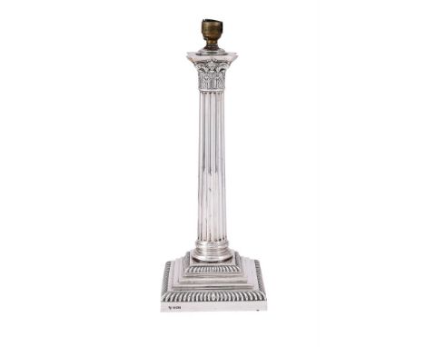 
	
		AN EDWARDIAN SILVER CORINTHIAN CANDLESTICK CONVERTED TO A LAMP
		HAWKSWORTH, EYRE &amp; CO. LTD., SHEFFIELD 1901
		With 